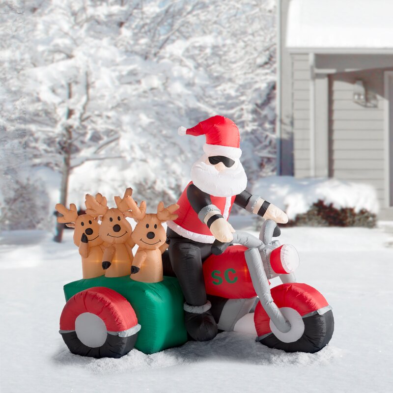 The Holiday Aisle Christmas Inflatable Santa Claus Driving Motorcycle with 3 Reindeer Decoration